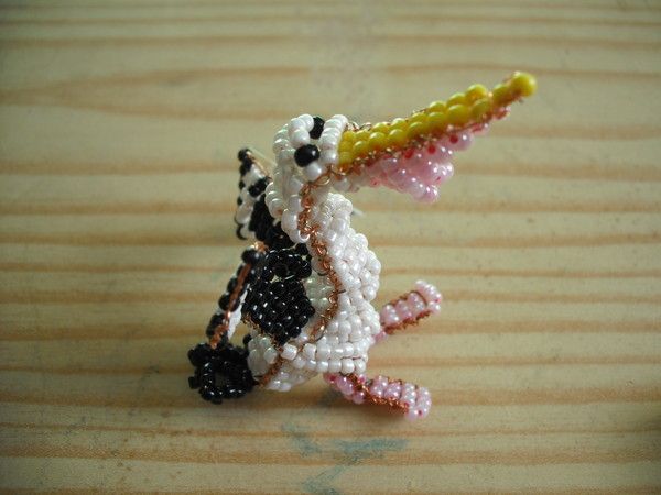 LE PELICAN qui PECHE